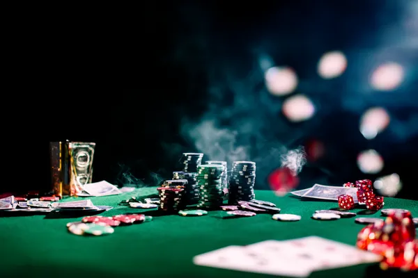 88FD Casino Games — Enjoy nonstop entertainment A close-up shot of golden coins falling around a spinning roulette wheel, representing immersive casino action at 88FD.